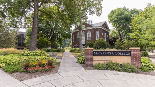 Photo of the Macalester College sign in front of campus.