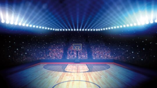 Computer-generated stock image of a basketball court with dramatic lighting