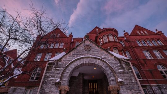 The exterior of Old Main, shot from a low angle