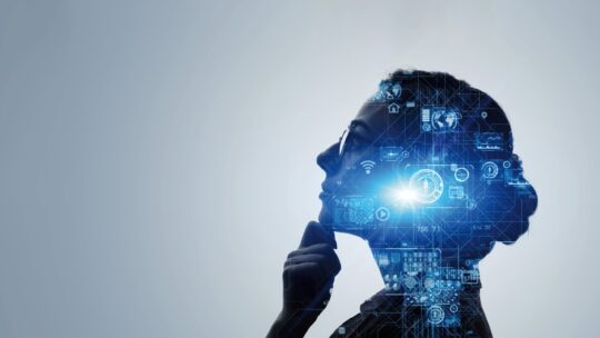 Stock image of the silhouette of a woman with her hand on her chin, looking up thoughtfully. CGI icons representing the internet surround her face.