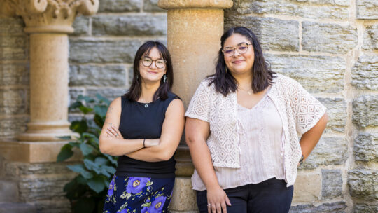 Mellon Mays Fellows Karla Garcia and Louise Yang pose outside of Old Main.