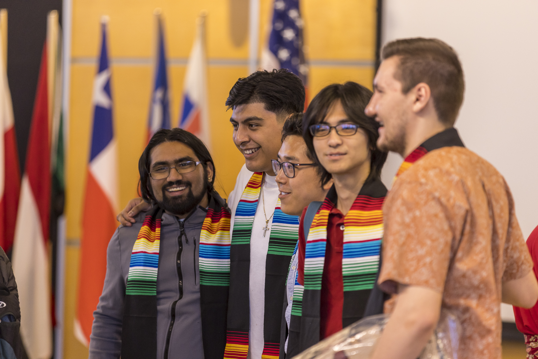 A row of smiling students