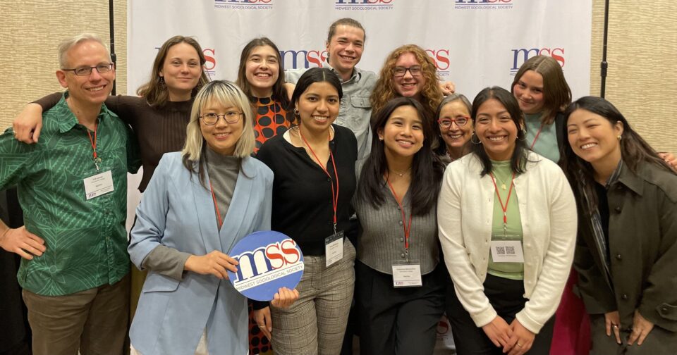 Students and faculty smiling at the 2024 Midwest Sociological Society annual meeting