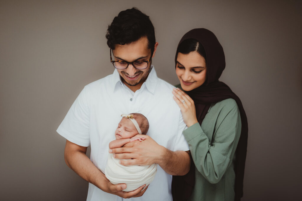 Professor Ali with her partner and daughter