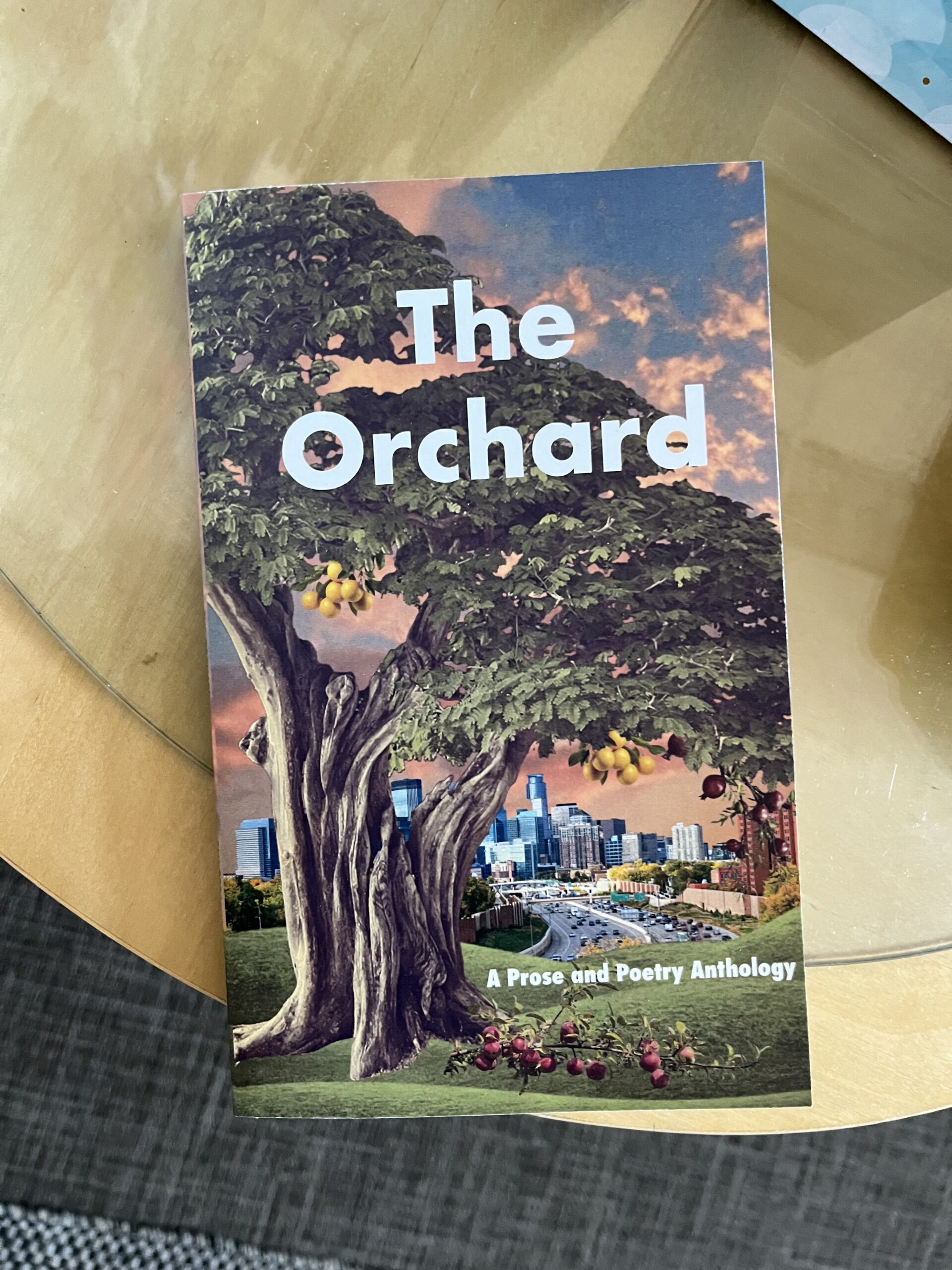 A copy of the Literary Publishing class's newest Anthologies release, The Orchard.