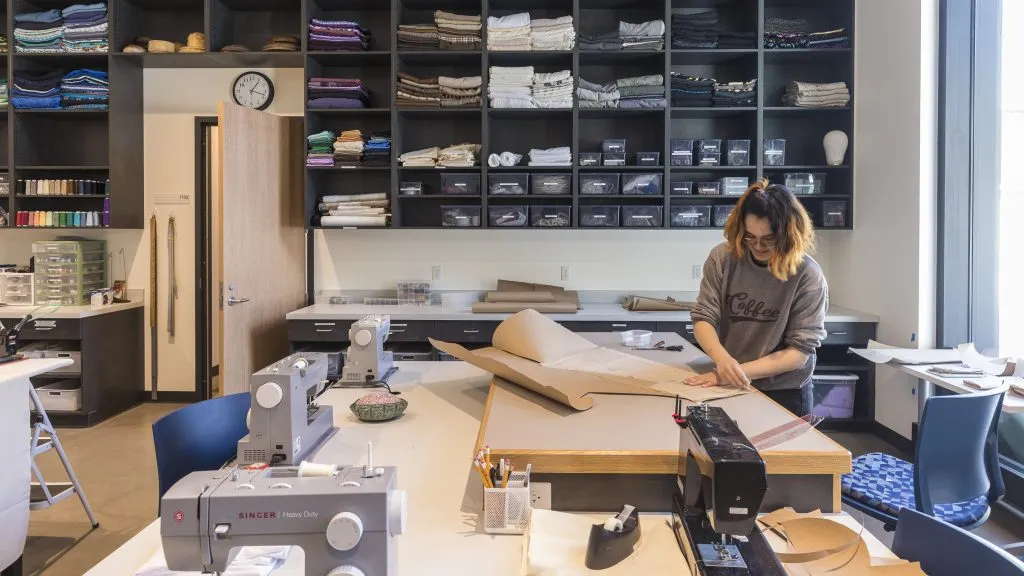 A student works on a project in the costume shop